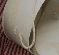 Detail of the carrying cord on the Hat Box