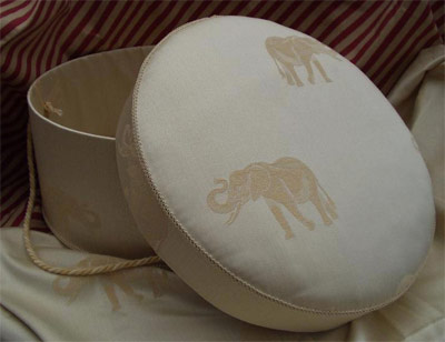 Elephant design detail on lid