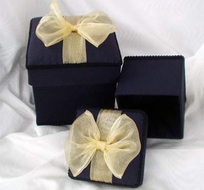 Black Moire Box topped with a Gold Organza Bow