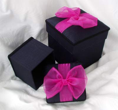 Black Moire Box topped with a Pink Organza Bow