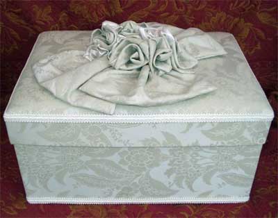 Rectangular Box covered in Cream Jacquard Fabric with Cream Satin Ribbon Flowers