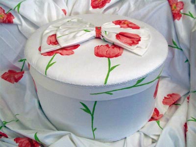 Hat Box covered in white fabric with red tulips