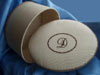 Moire with embroidered initial